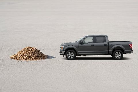 2 yd³ of wood chips vs pickup truck: size comparison