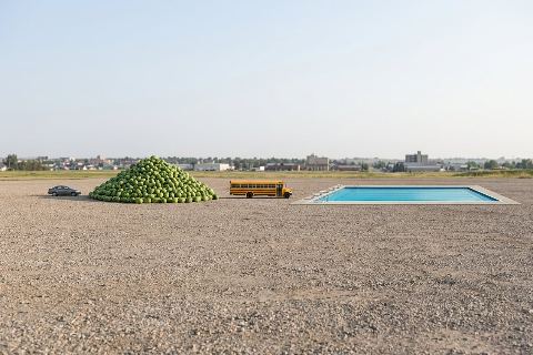 How many watermelons would fill an olympic swimming pool?