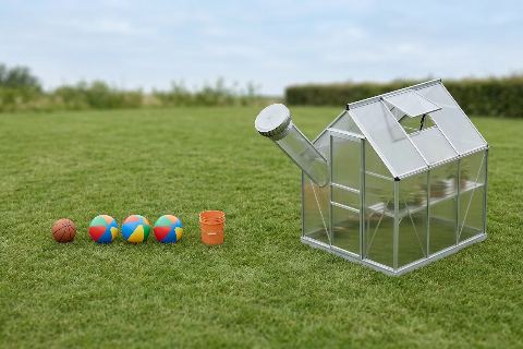 How many beach balls would fill a greenhouse?