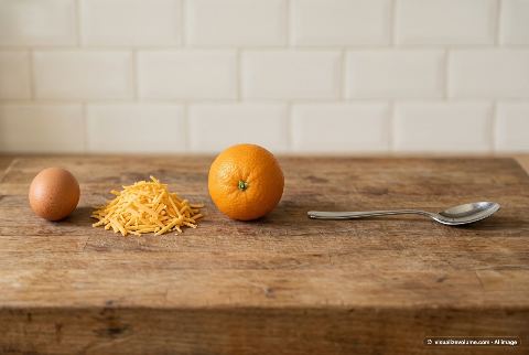Cheddar cheese, in “What does 2 ounces of shredded cheddar cheese look like?”