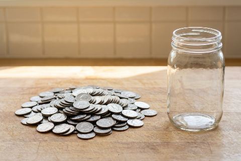 Mason jar, in “How many quarters would fill a mason jar?”