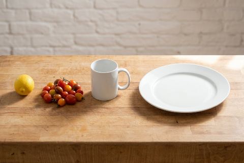 Dinner plate, in “What does 100 grams of tomatoes look like?”