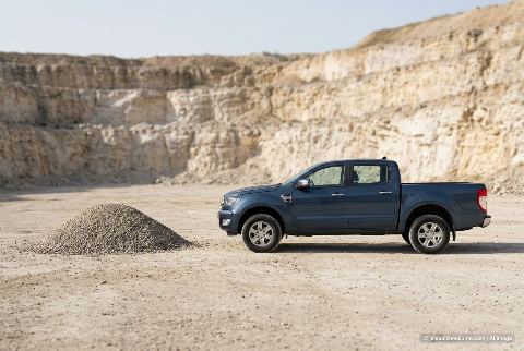 Full-size pickup truck, in “1 ton of gravel vs pickup truck”